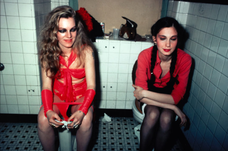 Nan Goldin: Nan Goldin, Cookie and Millie in the girls room at The Mudd Club, NYC, 1979, New York, NY, USA.  AWARE.

