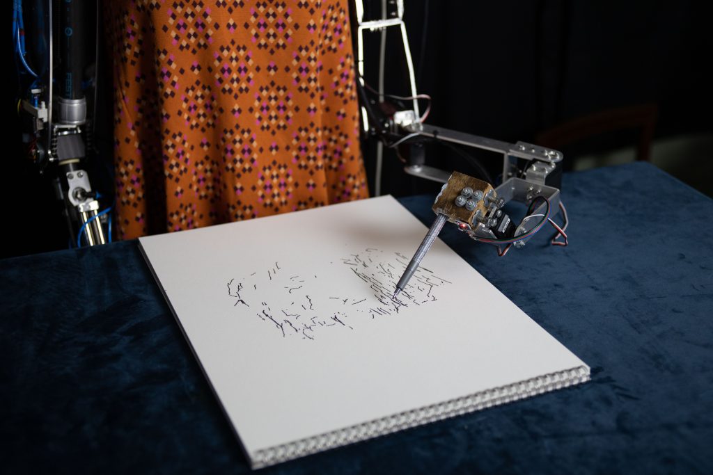 robot artist: Robot artist Ai-Da drawing. Courtesy of Ai-Da project.
