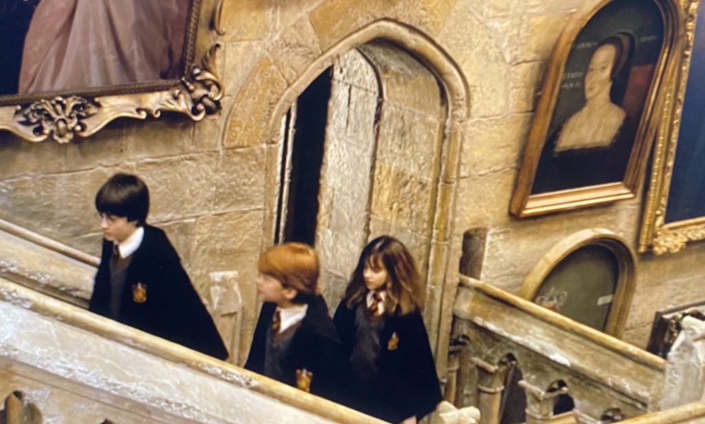 art in Harry Potter: Art reference to Anne Boleyn’s portrait in Harry Potter and the Sorcerer’s Stone, directed by Chris Columbus, 2001, Warner Bros. Pictures. Detail. 
