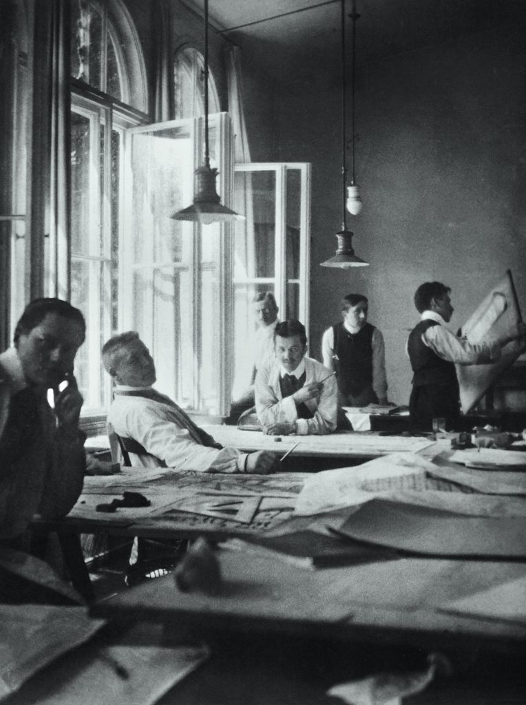 gropius biography: Walter Gropius (far right), Peter Behrens’ Babelsberg office, near Potsdam, 1908. Picture credit: C. Arthur Croyle Archive. Courtesy of the publisher.

As an assistant in the office, Gropius worked alongside Mies van der Rohe and his future architectural partner, Adolf Meyer. Le Corbusier joined the Behrens office in 1910. Left to right: Mies, Meyer, Max Hertwig, Bernhard Weyrather, Jean Chandler and Gropius.
