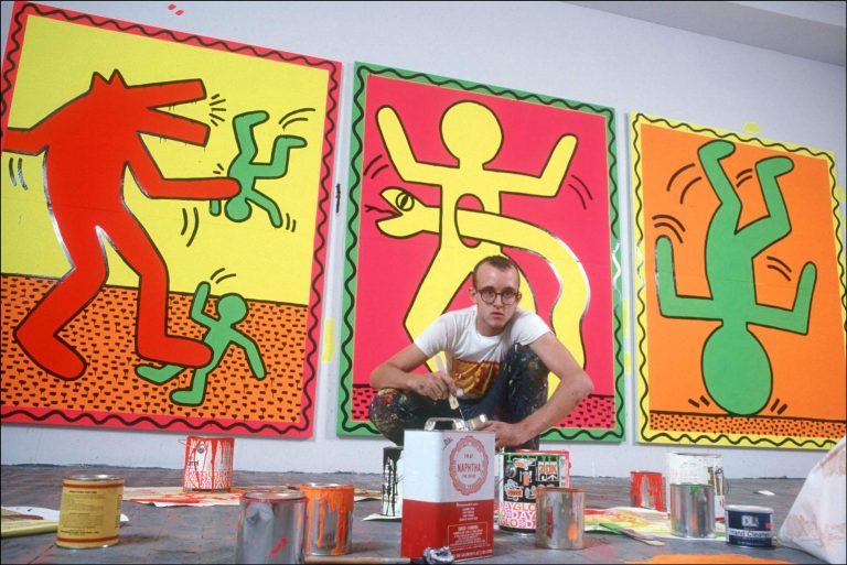Queer art: Artist Keith Haring at work in his studio in New York, October 28, 1982. Photographed by Allan Tannenbaum/Getty Images.
