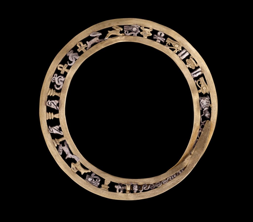 ancient egypt jewelry: Gold and silver flat openwork bangle with inset animal and amulet figures, ca. 2055 BCE to 1650 BCE, British Museum, London, UK.
