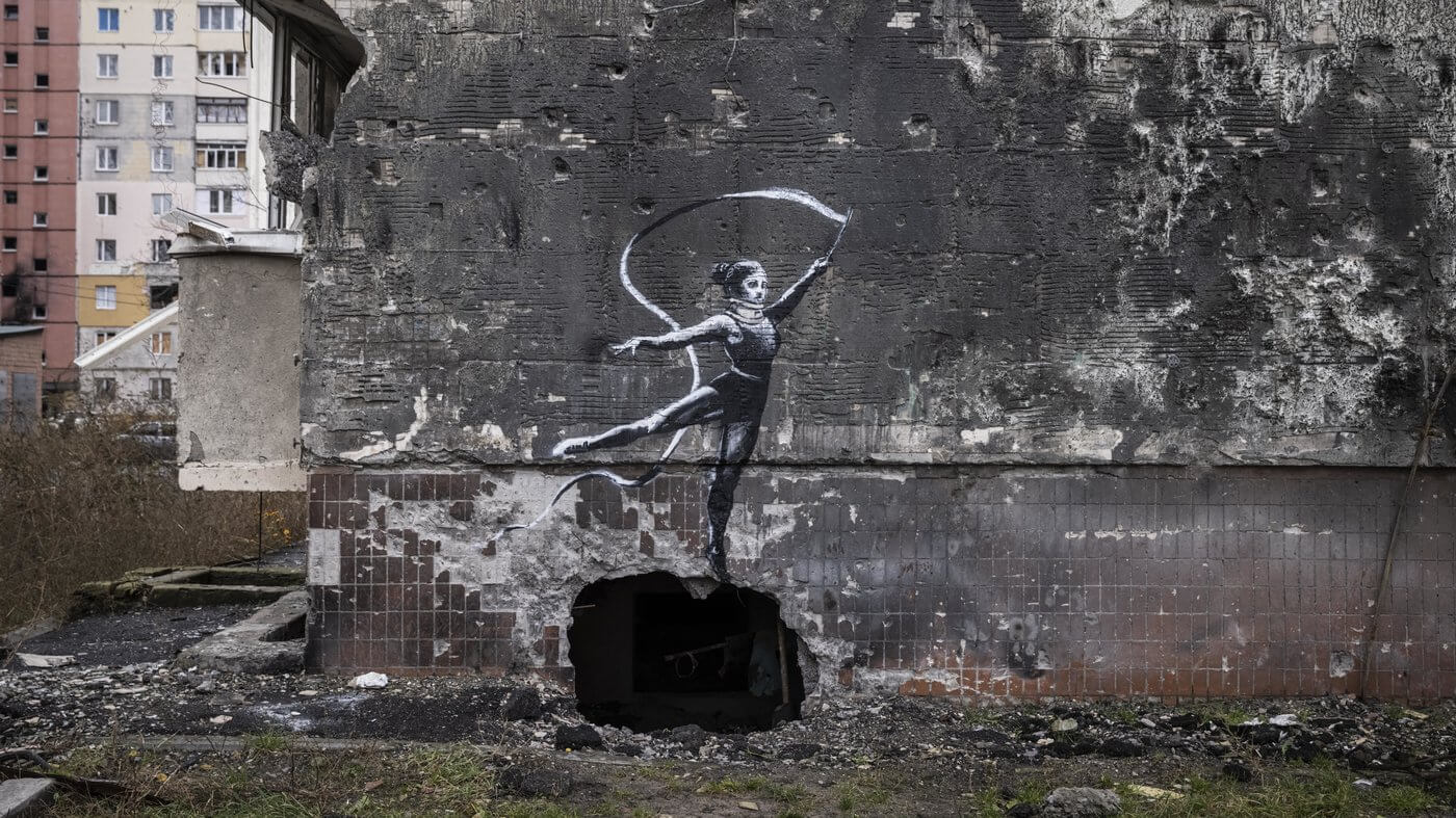Banksy, Gymnast with ribbon and neck brace, 2022, Irpin. 
