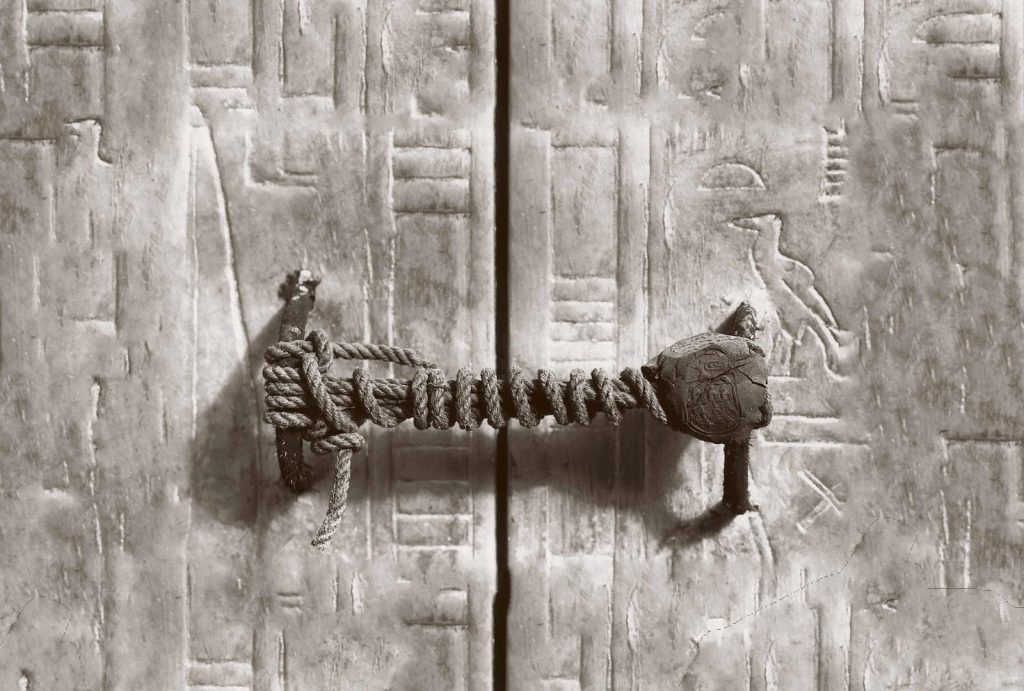 Tutankhamun: Photograph of the unbroken rope seal of Tutankhamun’s burial chamber, 1922, Luxor, Egipt.  Reddit.
