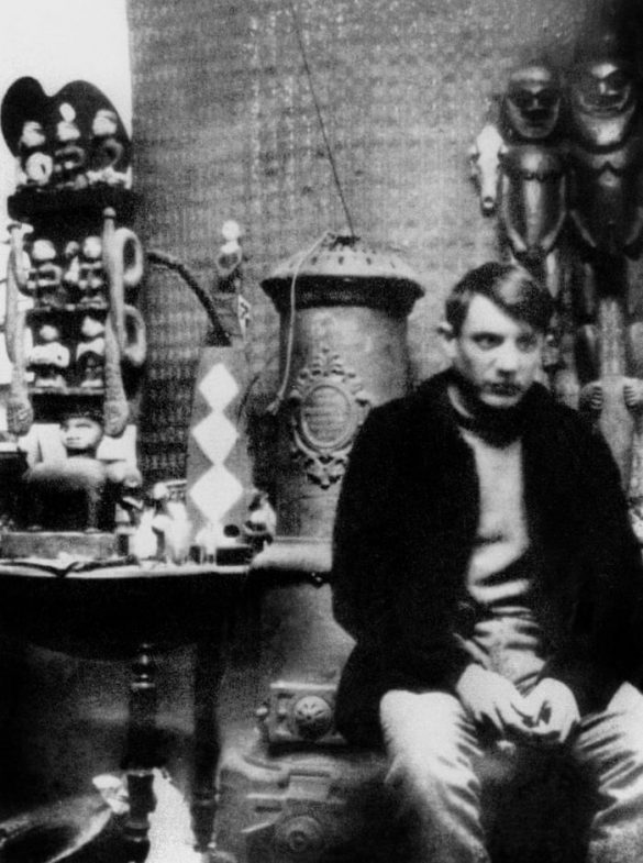 Picasso Ladies of Avignon: Photograph of Pablo Picasso in his workshop in Montmartre, Paris, surrounded by African art, ca. 1908. Photograph: Apic/Getty Images.
