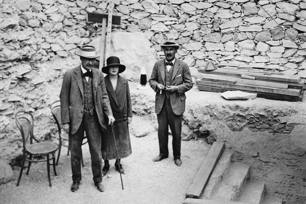 Tutankhamun: Lord Carnarvon (left) with his daughter Lady Evelyn Herbert (center) and Howard Carter (right) at the steps down to Tutankhamun’s tomb, 1922, The Times Archives.
