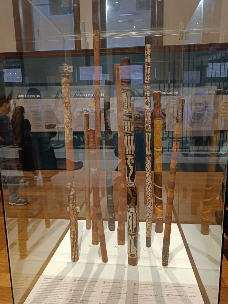 Indigenous Australian: Unknown Artists, Didgeridoos, uncertain data BCE, Australian Museum, Sydney, NSW, Australia. Photographed by the author.
