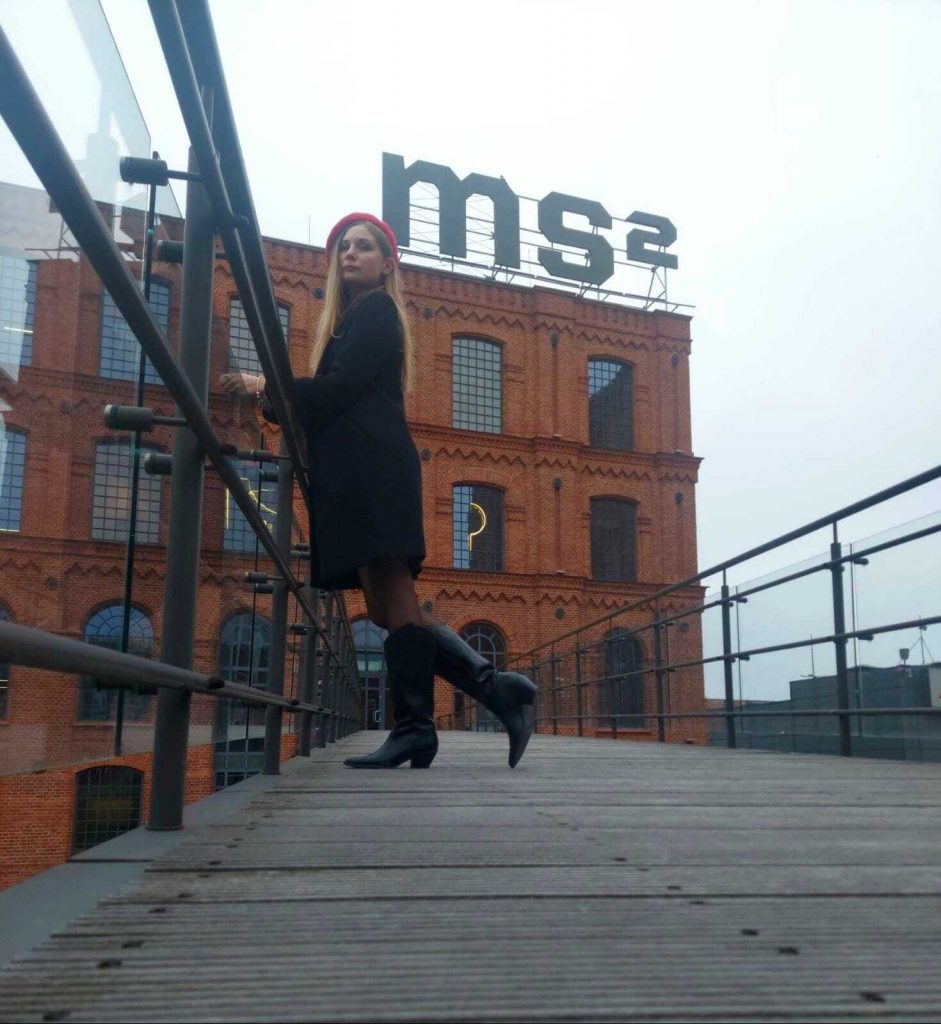 museum: Martyna Topolska in front of the MS2: Museum of Art, Łódź, Poland. Courtesy of the author.
