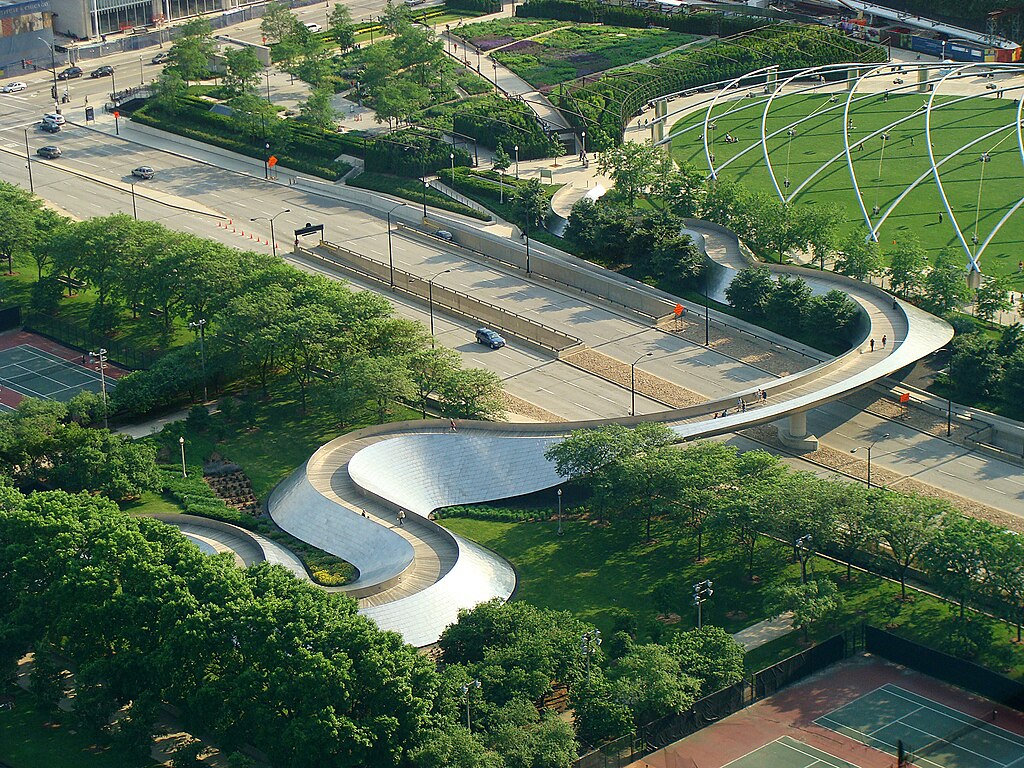 Frank Gehry: Frank Gehry, BP Bridge, Millennium Park, Chicago, IL, USA. Photo by Torsodog via Wikimedia Commons (CC BY-SA 3.0).
