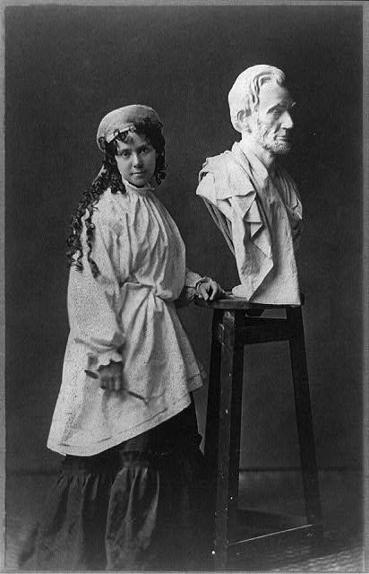 Vinnie Ream: Photo of Vinnie Ream posing with one of her early portrait busts of Lincoln, c. 1866, Library of Congress, Washington, DC, USA.
