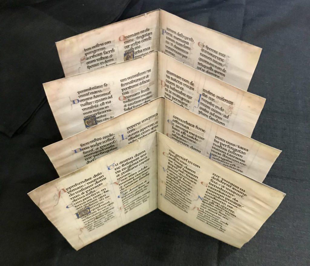 Cities Of Women: Quires (folded pages) of an illuminated manuscript. Photograph by Sarah Charles, 2019, Institute of Historical Research, School of Advanced Study, University of London, London, UK.
