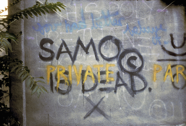 Basquiat Paintings: Basquiat in 5 Paintings: Jean-Michel Basquiat, “SAMO©” graffiti. Photograph by Martha Cooper, New York, 1982. Art in the Streets.
