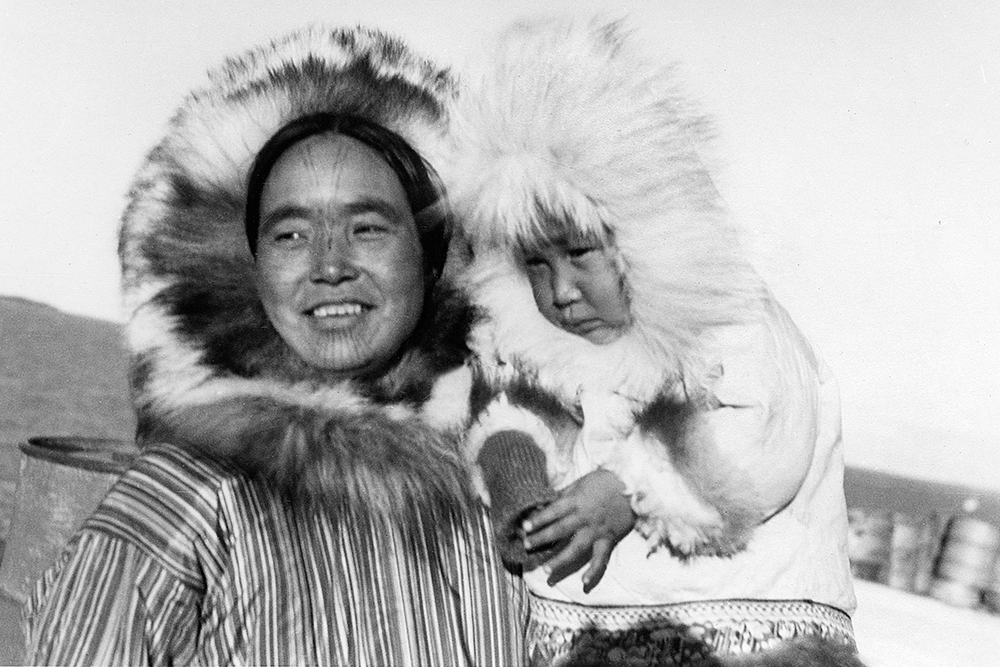 inuit art: Kuptana holding Donald Ayalik, 1937. Photo credit: Nwt Archives / Henry G. Cook, Bishop of The Diocese of The Arctic, 1906 / N-1979-032: 0016, Photo by Henry G. Cook.
