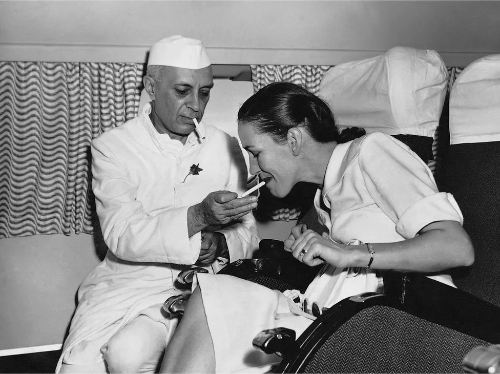 Homai Vyarawalla: Homai Vyarawalla, Mr Nehru Lights A Cigarette For the Wife of a British Diplomat, The Alkazi Foundation for the Arts, Delhi, India. 
