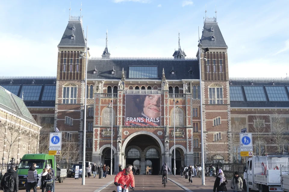 frans hals exhibition: Outside view of the Rijksmuseum façade with the Frans Hals exhibition poster, 2024, Amsterdam, Netherlands. Yahoo.

