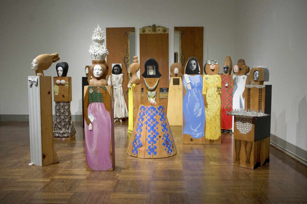Marisol Escobar: Marisol Escobar, The Party, 1965. Toledo Museum of Art.
