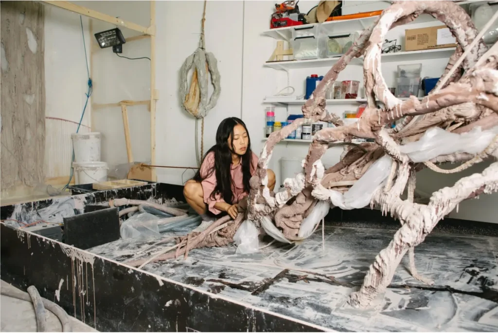 Mire Lee Tate: Mire Lee in her studio. Photograph by Melissa Schriek / The New York Times. Tina Kim Gallery.
