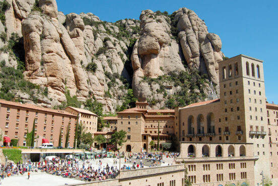 Photograph of the Montserrat Monastery (a building in the mountain cliffs).