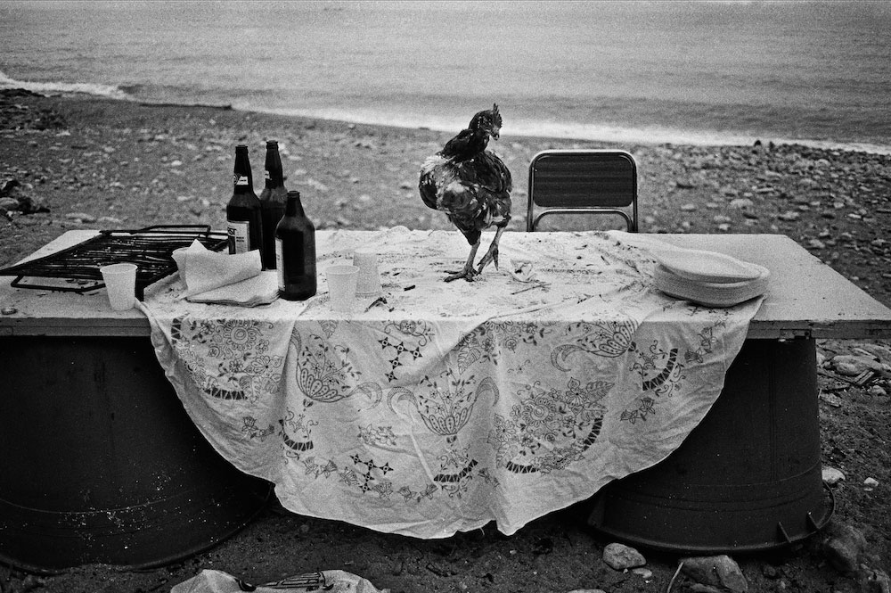 Letizia Battaglia: Letizia Battaglia, At Arenella Beach, The Party is Over, Palermo 1986, Letizia Battaglia Archive.
