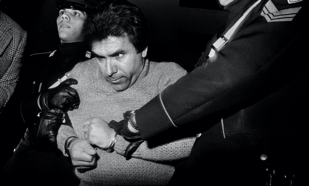 Letizia Battaglia: Letizia Battaglia, The arrest of the boss Leoluca Bagarella, Palermo, 1980, Letizia Battaglia Archive.
