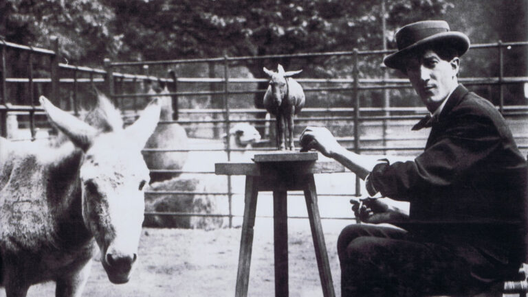 Bugatti brothers: Rembrandt Bugatti working at Antwerp Zoo, 1910. The History Blog.
