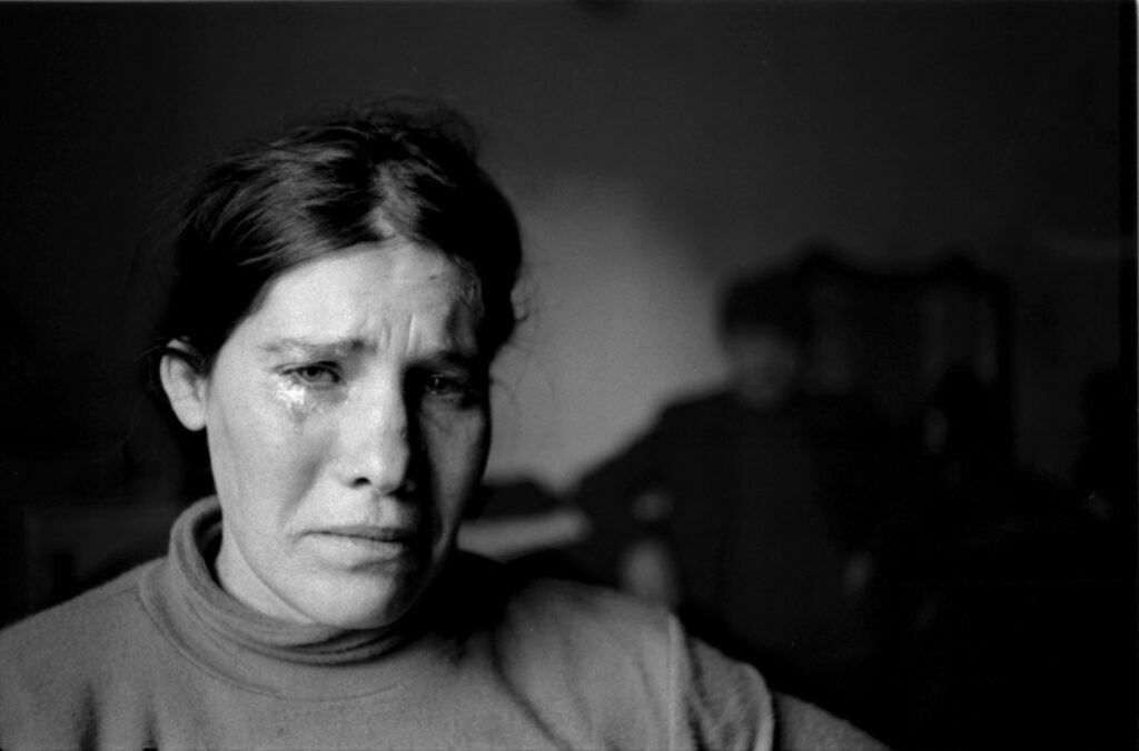 Letizia Battaglia: Letizia Battaglia, A woman crying over her misery, San Vito Lo Capo, Trapani, 1980, Letizia Battaglia Archive.
