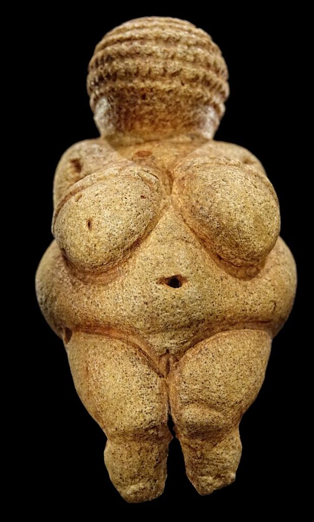 Women in art: Venus of Willendorf, 24,000-22,000 BCE, Naturhistorisches Museum, Vienna, Austria. Photograph by Bjørn Christian Tørrissen via Wikimedia Commons (CC BY-SA 4.0).
