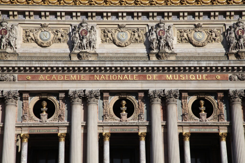 Opera Garnier: Façade of the Opéra Garnier, Paris, France. Photograph by MarcJP46 via Wikimedia Commons (CC BY-SA 4.0). Detail.
