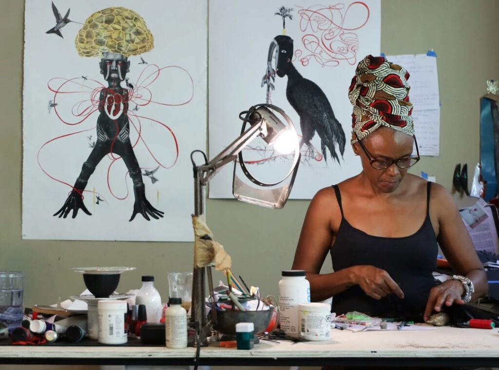 Jasmine Thomas-Girvan: Jasmine Thomas-Girvan in her studio. Photograph by David Zwirner.
