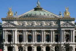 Photograph of a building with a lot of decoration and relief scultpures.