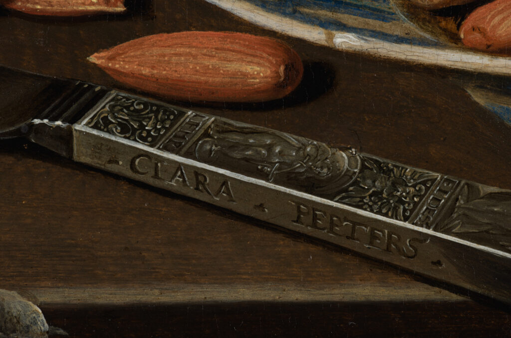Clara Peeters: Clara Peeters, Still Life with Cheeses, Almonds, and Pretzels, c. 1615, Mauritshuis, The Hague, Netherlands. Detail.
