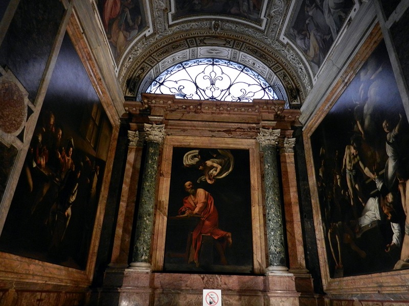 Calling of Saint Matthew: The interior of Contarelli Chapel, San Luigi dei Francesi, Rome, Italy. Photograph by Geobia via Wikimedia Commons (CC BY-SA 3.0).

