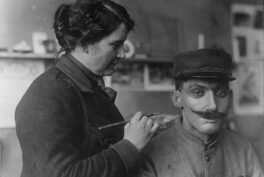 Mrs. Anna Coleman Ladd and Mr Caudron. Mrs. A. Coleman Ladd working on portrait mask. 1918. Photograph. Library of Congress. Washington, D.C. USA.