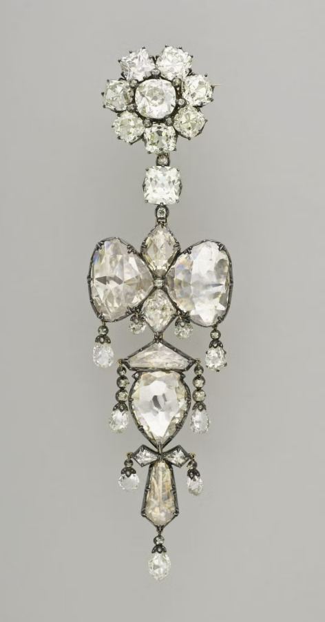 french crown jewels: Reliquary brooch of Empress Eugénie, mid-19th century, Louvre, Paris, France. Photography by GrandPalaisRmn (Louvre Museum)/Stéphane Maréchalle. Town & Country Magazine.
