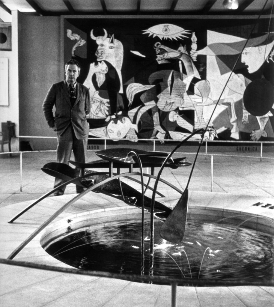 Miró United States: Alexander Calder next to his Mercury Fountain, 1937, and Pablo Picasso’s Guernica, 1937, Spanish Pavilion, Paris World’s Fair, 1937. Calder Foundation.
