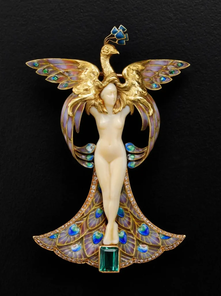 Art Nouveau jewelry: Philippe Wolfers, The Maiden and the Peacock, 1900–1902. Pinterest.
