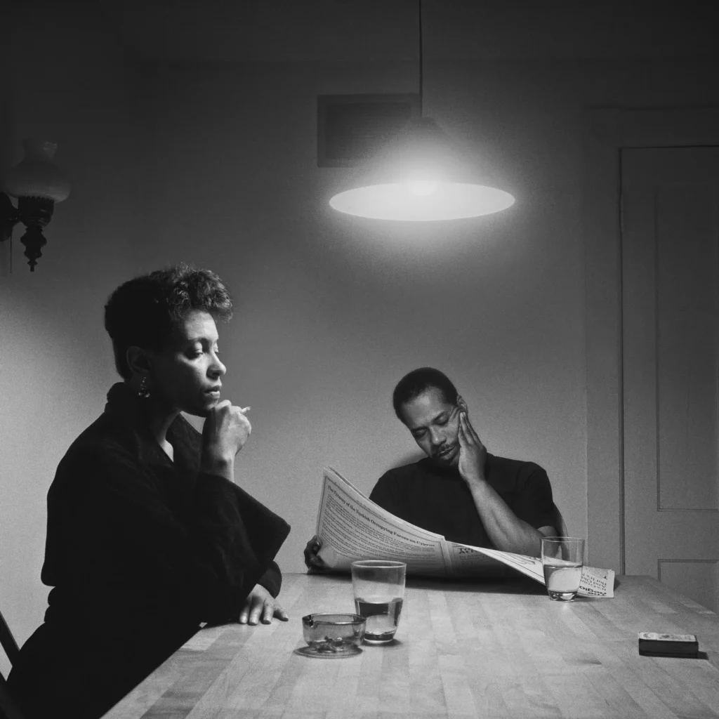 Carrie Mae Weems: Carrie Mae Weems, Kitchen Table Series: Untitled (Man Reading Newspaper), 1990. Artist’s website.
