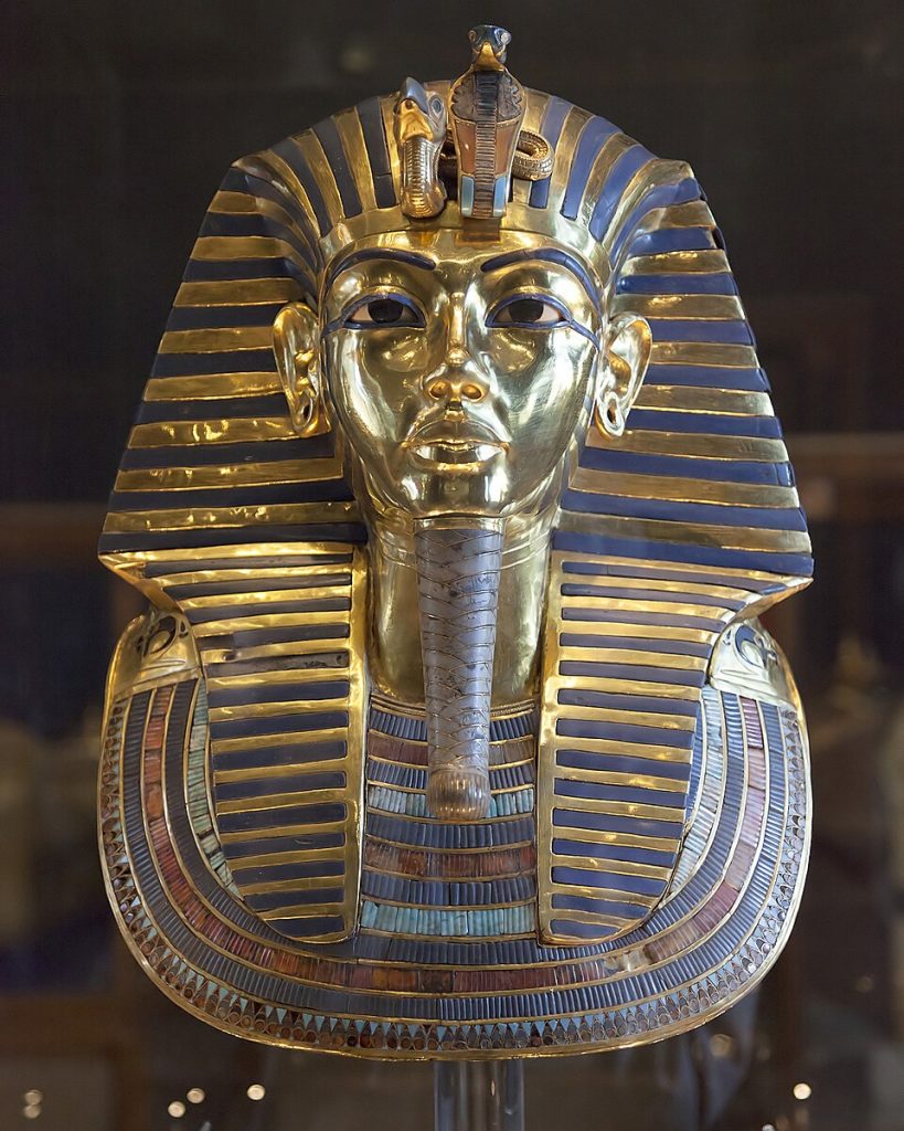Grand Egyptian Museum: Funerary Mask of Tutankhamun, c. 1323 BCE, Grand Egyptian Museum, Cairo, Egypt. Photograph by Robert Unger via Wikimedia Commons (CC-BY-SA-3.0, 2.5, 2.0, 1.0).
