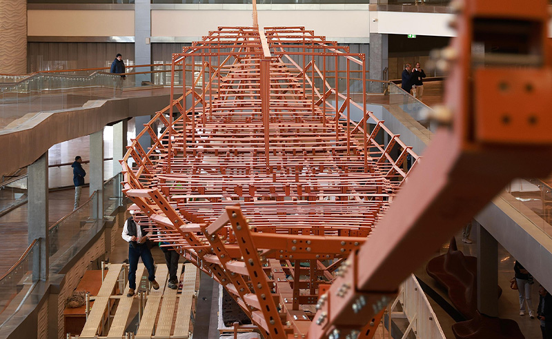 Grand Egyptian Museum: Khufu’s Boat during the restoration process, Grand Egyptian Museum, Cairo, Egypt. Cairo Scene.
