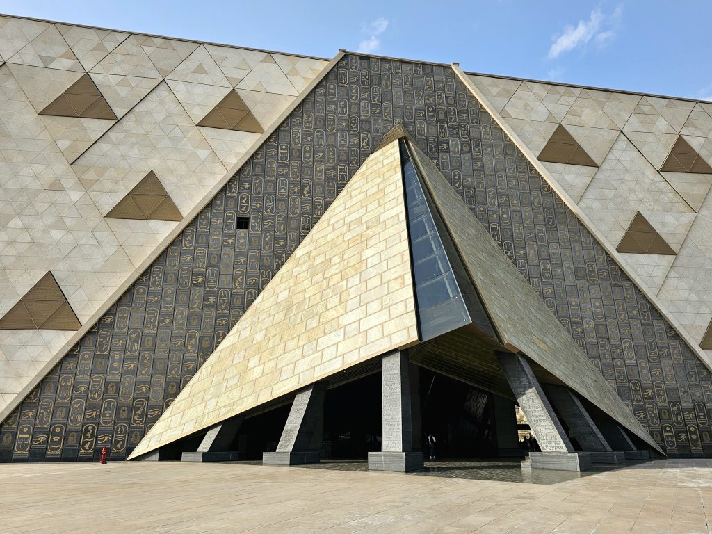 Grand Egyptian Museum: Main entrance of the Grand Egyptian Museum, 2025, Cairo, Egypt. Photograph by Richard Mortel via Wikimedia Commons (CC BY 2.0).
