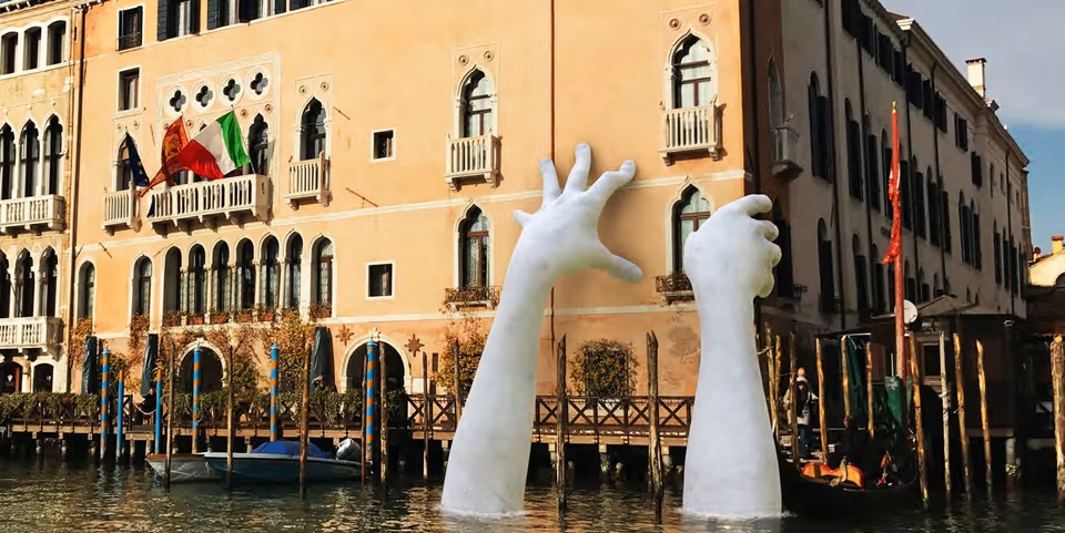 Must-See Exhibitions 2026: Must-See Exhibitions in 2026: Lorenzo Quinn, Support, 2017, installation during the Venice Biennale 2017, Ca’Sagredo Hotel, Venice, Italy. HypeBeast.
