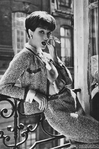 coco chanel designs: Marie-Hélène Arnaud wearing the revamped tweed suit, 1950s. Marie Claire.
