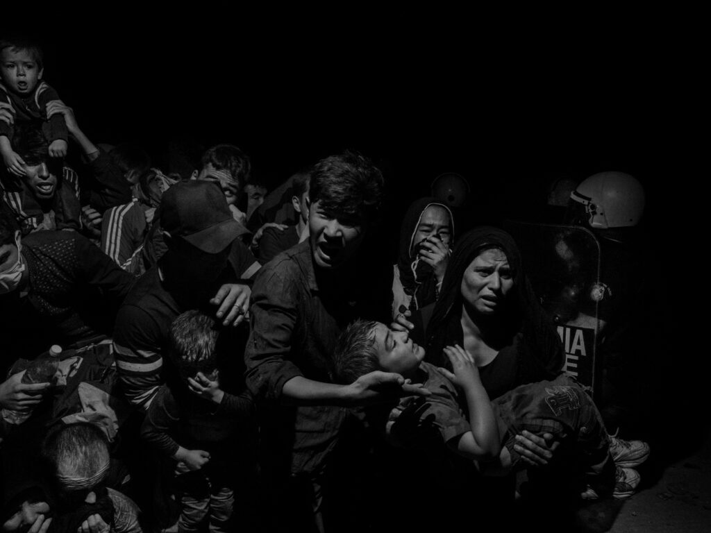migrant photographs: Alex Majoli, Scene #60410, Lesbos, Greece, 2015, Howard Greenberg Gallery, New York City, NY, USA.
