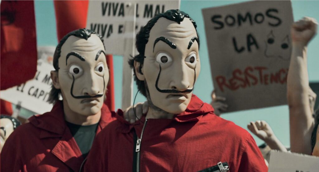 Money Heist mask: Still from Money Heist, S1E02, Netflix. IMDb.
