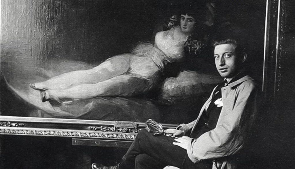 Evacuation of Prado Museum: Manuel de Arpe, conservator at the Prado Museum, next to Goya’s The Clothed Maja. El País. 
