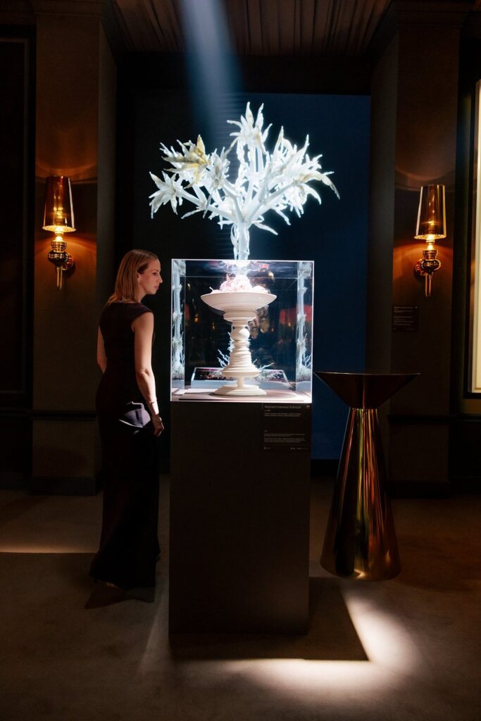 Top Charity Auction 2026: Curator Natalia Bradbury with Wojciech Ireneusz Sobczyk, Tree, 2022, exhibition view of TOP CHARITY Art 2026, Wilanów Palace, Warsaw, Poland. Photo: Alex Dolny.
