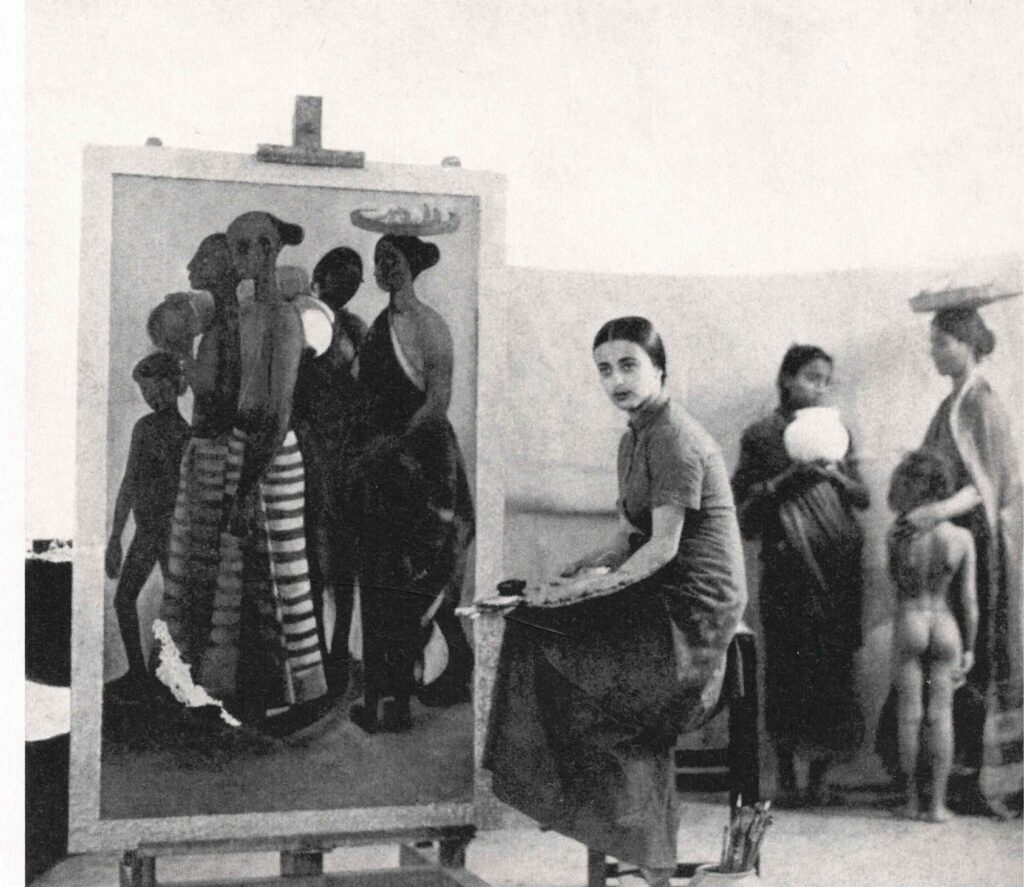 Amrita Sher-Gil paintings: Amrita Sher-Gil painting South Indian Villagers Going to Market with three of the models at her home in Simla, 1937. Wikimedia Commons (public domain).
