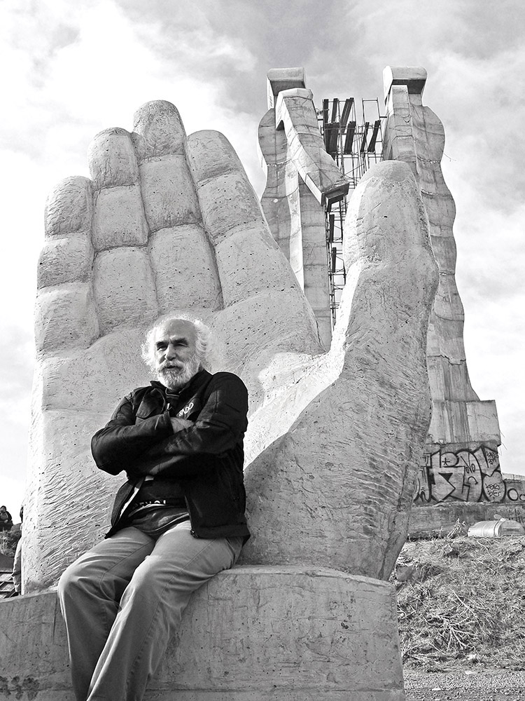 Monument to Humanity: Mehmet Aksoy in front of the Monument to Humanity, Kars, Turkey. Artist’s website.
