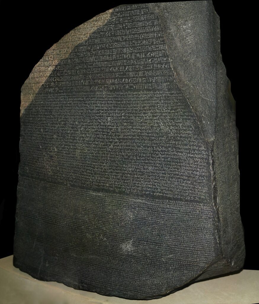 Rosetta Stone history: Rosetta Stone, 196 BCE, British Museum, London, UK. Photograph Hans Hillewaert via Wikimedia Commons (CC BY-SA 4.0).
