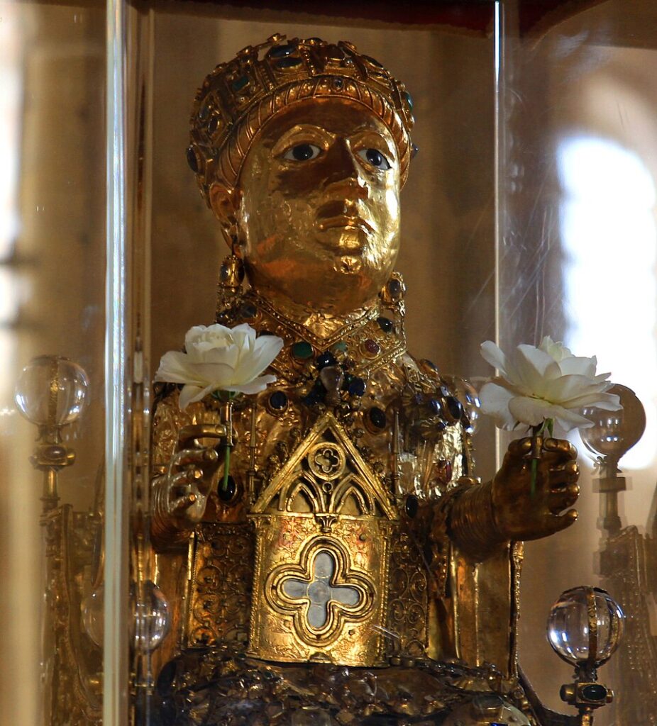 DailyArt Magazine birthday: The reliquary of Sainte Foy, 9th century with a 5th-century Roman head, Abbey Church of Sainte-Foy, Conques, France. Photograph by ZiYouXunLu via Wikimedia. Commons (CC BY-SA 3.0).
